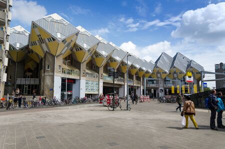 Rotterdam, Netherlands - May 9, 2015: Tourist visit Cube Houses the iconic in the center of the city. Cube Houses are a set of innovative houses built in Rotterdam and Helmond in the Netherlands, designed by architect Piet Blom.のeditorial素材