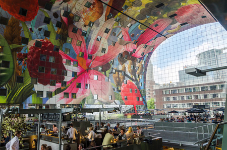 Rotterdam, Netherlands - May 9, 2015: Retail Shop in Markthal (Market hall) a new icon in Rotterdam. The covered food market and housing development shaped like a giant arch by Dutch architects MVRDV.のeditorial素材