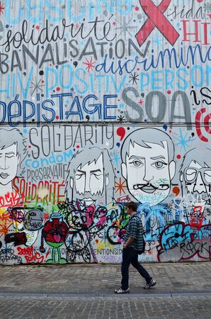 Brussels, Belgium - May 12, 2015: The graffiti on the house wall,  street art is very popular in the city, May 12, 2015 in Brussels, Belgiumのeditorial素材