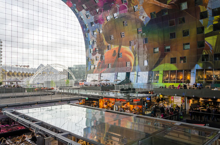 Rotterdam, Netherlands - May 9, 2015: People shopping in Markthal (Market hall) a new icon in Rotterdam. The covered food market and housing development shaped like a giant arch by Dutch architects MVRDV.のeditorial素材