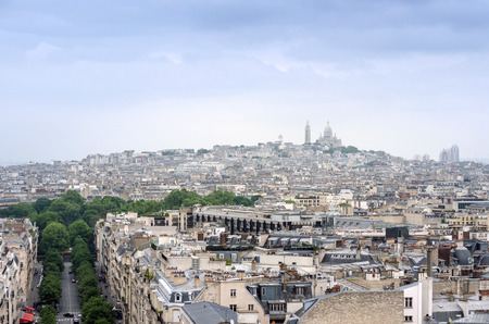Basilica Sacre Coeur in montmartre with paris skyline, Paris, France.の写真素材