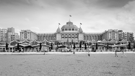 The Hague, Netherlands - May 8, 2015: Tourists at Kurhaus of Scheveningen, The Hague in the Netherlands is a hotel which is called the "Grand Hotel Amrath Kurhaus The Hague" since October 2014. It is located in the main seaside resort area, near the beachのeditorial素材