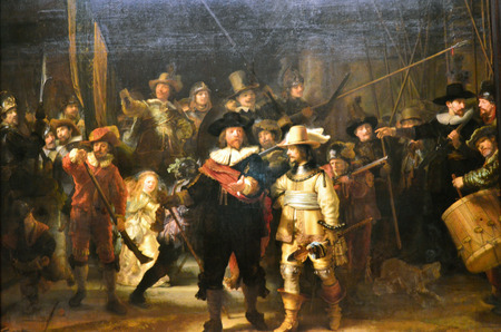 Amsterdam, Netherlands - May 6, 2015: The painting Night watch at Rijksmuseum, Amsterdam, Netherlands. The Night Watch is one of the most famous Dutch Golden Age paintings and is window 16 in the Canon of Amsterdam.