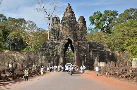Siem Reap, Cambodia - December 4, 2015: Tourists at South gate to Angkor Thom in Siem Reap, Cambodia. The capital of the ancient Khmer empire.のeditorial素材