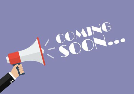 Hand holding megaphone with word Coming soon. Vector Illustrationのイラスト素材