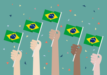 Hands Holding Up Brazil Flags.のイラスト素材