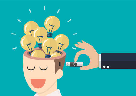 Businessman hand holding usb flash drive to connect other businessman head. Business idea concept...