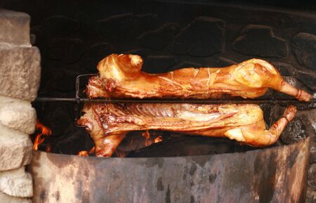 Roasted pig on the spitの写真素材