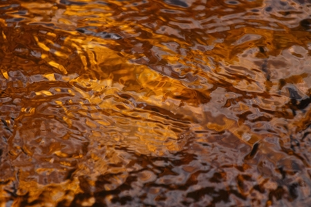 Surface of beautiful river  flowing from moorlandの写真素材