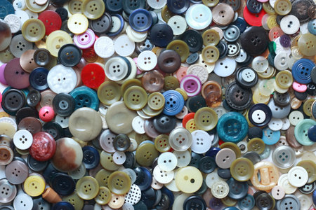 Background made from colorful sewing buttons. Flat lay of various clothing buttons.の写真素材
