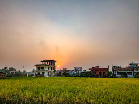 Sunset in the flat lands of Nepal. Countryside. Farm, Field.の写真素材