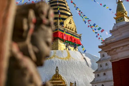 Kathmandu, Nepal - November 4 2018: People painting Swayambhunath Stupa.