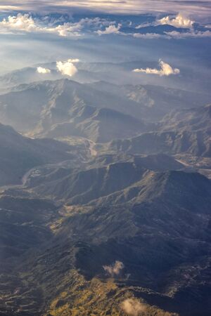 Hills and mountains in Nepal as seen from an airplaneの写真素材