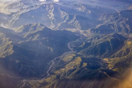 Hills and mountains in Nepal as seen from an airplaneの写真素材