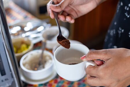 Making a cup of coffeeの写真素材