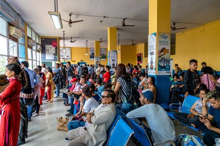 People waiting at airport terminal