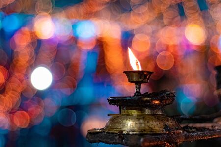 Diwali candle diya or butter lamps with bokehの写真素材