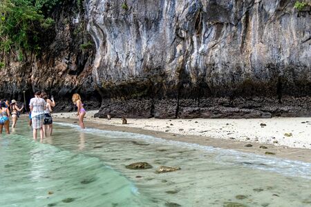 Phi Phi Island, Thailand - November 24 2019: Tourists enjoying their visit to the Monkey Beach on Phi Phi Island. Monkey beach is about 5 minutes boat ride from the pier.のeditorial素材