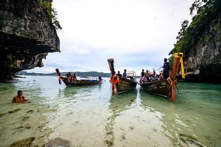 Phi Phi Island, Thailand - November 24 2019: Traditional longtail boats parked at Monkey Beach in Phi Phi Islands, Thailand.のeditorial素材