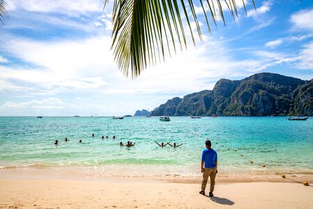 Phi Phi, Thailand - November 26 2019: People swimming at a tropical summer beachのeditorial素材