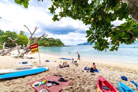 Phuket, Thailand - November 27 2019: Paradise Beach in Phuket, Thailand. Famous tourist attraction. Tropical Beach. Perfect summer getaway.のeditorial素材