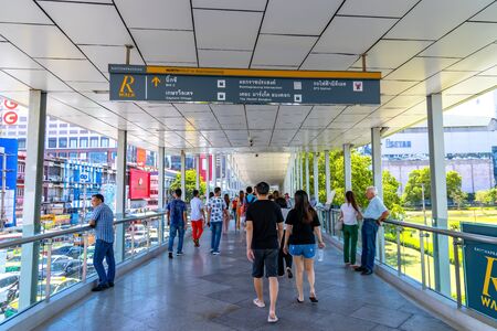 Bangkok, Thailand - November 29 2019: Crowd of pedestrian bustling away on a busy day on the Ratchaprasong District R Walk elevated pedestrian walkway.のeditorial素材