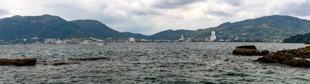 Phuket skyline and cityscape seen from Andaman Sea. Selective focus.の写真素材