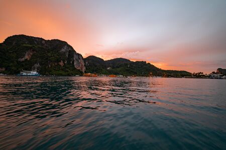 Stunning Golden Hour Sea Scape at Phi Phi Islands in Andaman Sea, Thailand. selective focusの写真素材