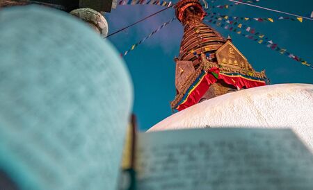 A journal notecopy placed against a monastery outdoors at an evening. writing blogging student concept. selective focusの写真素材