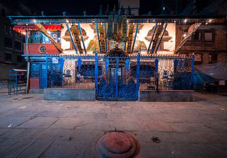 Hindu Temple decorated with lights at night time