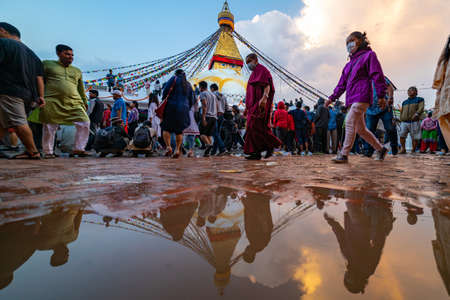 Kathmandu, Nepal - June 30 2019: Crowd of Buddhist Devotees Circulating the holy Boudhanath Stupa on the occasion Buddha Purnima aka Buddha Jayanti.のeditorial素材