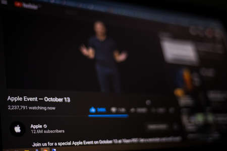 Kathmandu, Nepal - October 13 2020: Watching Apple event online on Apple's YouTube Channel. More than 2.5 million people tuned in to watch iPhone 12 launch event. selective focus - focus on numbers.のeditorial素材