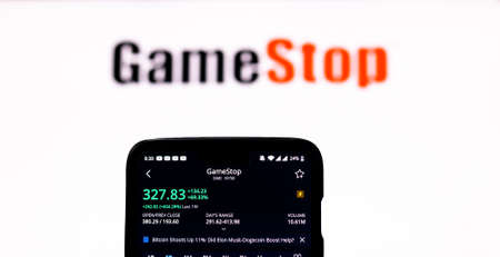 Kathmandu, Nepal - January 29 2021: Stock trading app on phone shows stock price of GME against GameStop logo.のeditorial素材