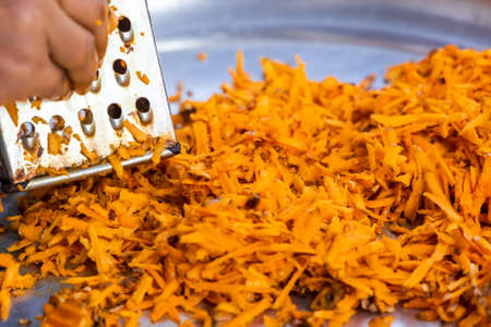 Turmeric roots closeup. Fresh harvest of many turmeric roots background texture.の写真素材