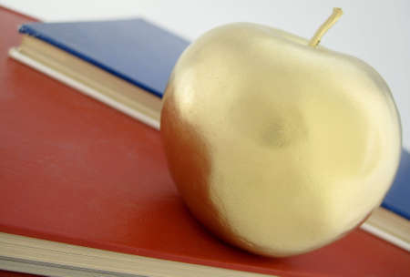 Books and Gold Appleの写真素材