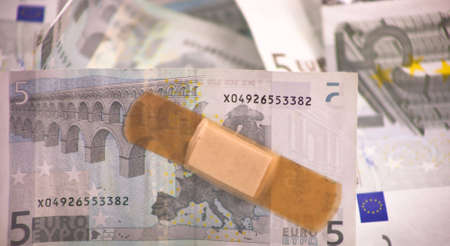 A close up of a whole bunch of Euro's.
