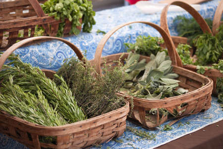 A close up of a bunch of spices at the farmers market.の写真素材
