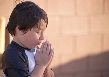 A close up of a young about to dive into a pool.の写真素材