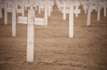 A shot of crosses on a beach to honor US service men and women.