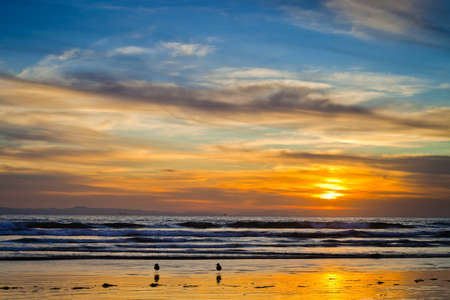A sunset shot looking out from Huntington Beach, CA.の写真素材