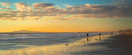 A wide sunset shot  in Huntington Beach  on a cool winter day looking down to Long Beach 