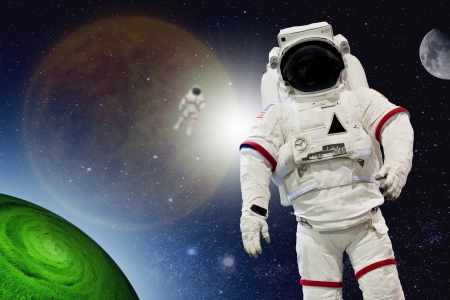 Astronaut Wearing Pressure Suit in a Space Background の写真素材