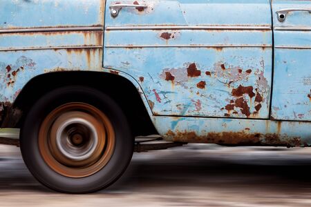 close up of old car wheelの写真素材
