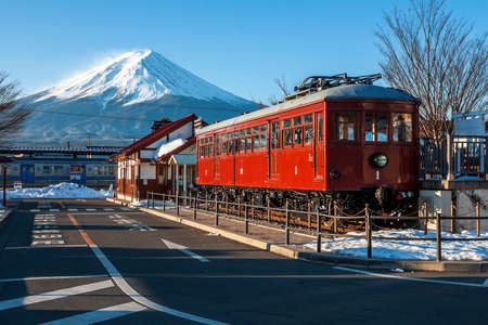 FUJIKAWAGUCHIKO, JAPAN - February 10,2016 : Carnergie model 1897 train displayed in front of Kawaguchiko Station. The station is famous for scenery of Mt. Fuji.のeditorial素材