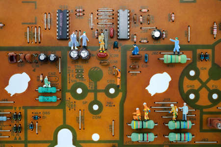Miniature technicians peoples on circuit board