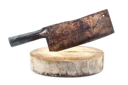 rusty chopper knife on wooden chopping board isolated on white backgroundの写真素材