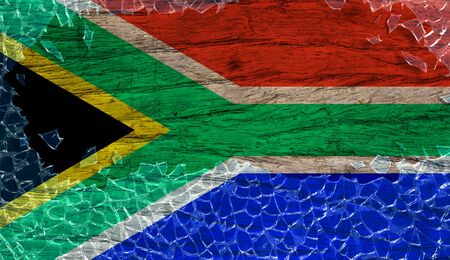 South Africa flag on wooden texture in broken glass frame, vintage styleの写真素材