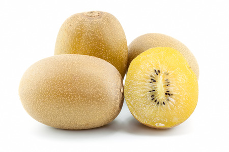 SunGold kiwi fruit slices on white backgroundの写真素材