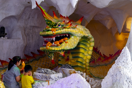 Khon kean, Thailand ; AUG. 13 '2018 - Naga's cave and statue in Shiva Mahatap Tewalai temple, is a famous hindu temple with sculpture park and religious statues, located near Khon Kaen city, Thailand.のeditorial素材