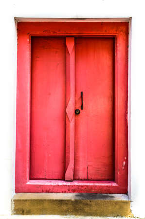 Old red doorの写真素材